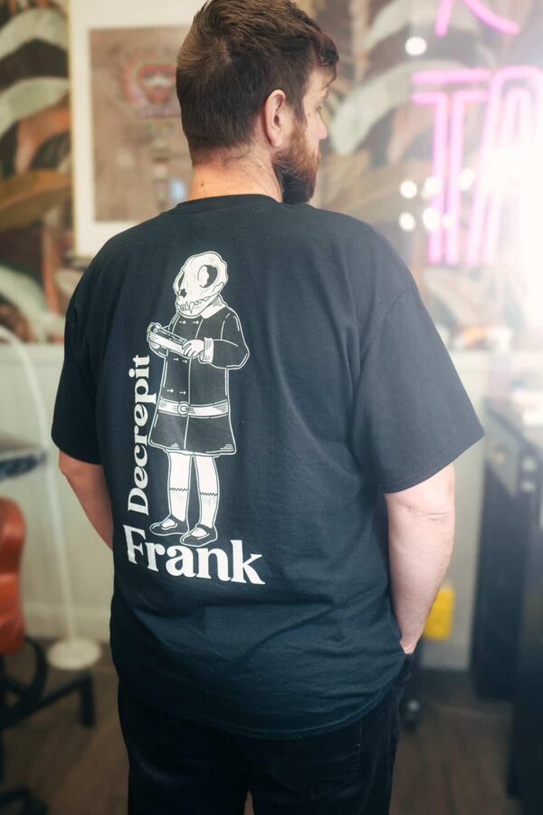 man wearing decrepit frank shirt